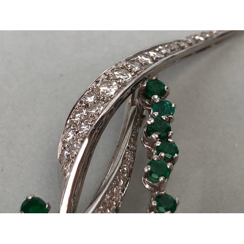 46 - 18ct White Gold twist Spray Brooch set with round brilliant cut diamonds and round cut Emeralds (pro... 