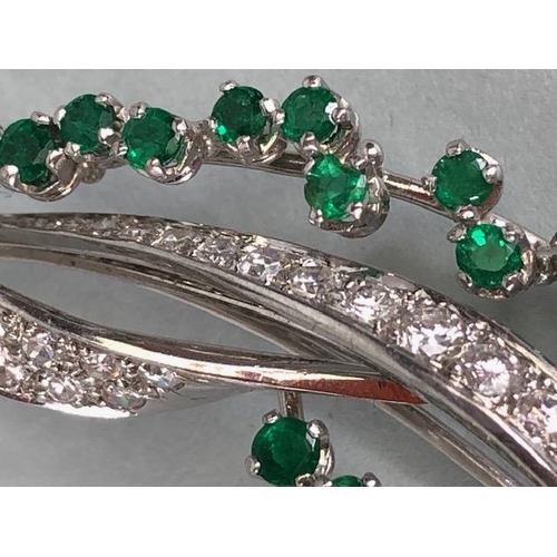 46 - 18ct White Gold twist Spray Brooch set with round brilliant cut diamonds and round cut Emeralds (pro... 