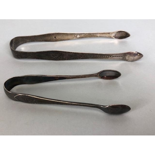 54 - Antique English Silver hallmarked Sugar tongs, condiment spoons an sugar sifter approximately 54.8g3... 