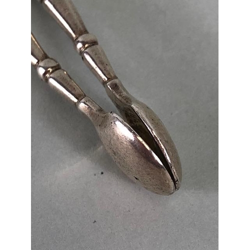 55 - English silver sugar nips hall marked for London Wakely and Wheeler, approximately 25.1g