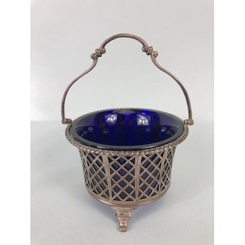 56 - Antique English silver hallmarked basket work sugar or bonbon dish, with blue glass liner, approxima... 