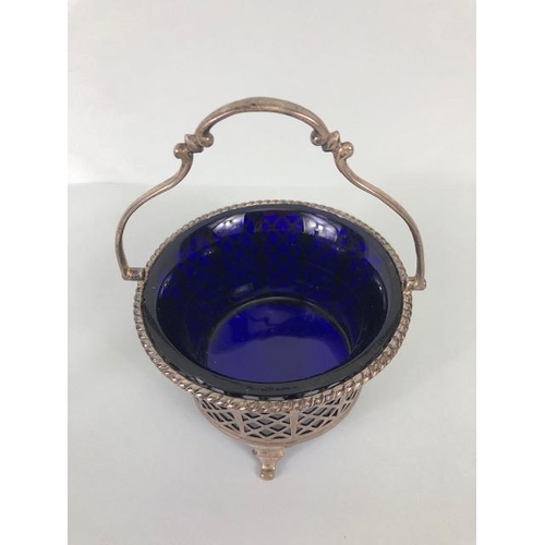 56 - Antique English silver hallmarked basket work sugar or bonbon dish, with blue glass liner, approxima... 