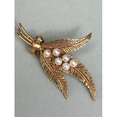 57 - 9ct gold hall marked brooch designed as a spray of lily of the valley flowers and a 9ct gold mounted... 