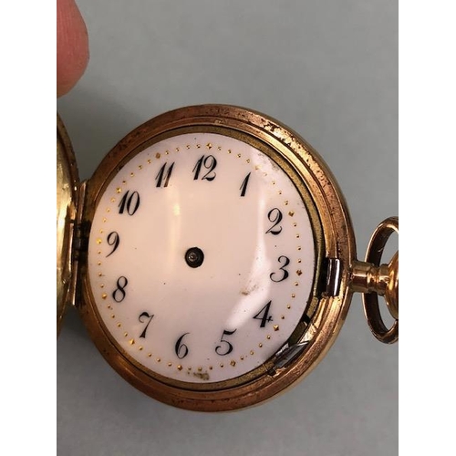 61 - !4ct antique gold  full hunter fob watch, white enamel face with Arabic numerals, case stamped 585, ... 