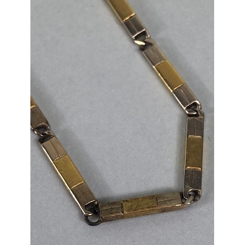 63 - 14ct (stamped 585) yellow and white bar fob watch chain approximately 37cm in length and 12.5g