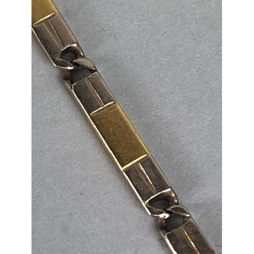 63 - 14ct (stamped 585) yellow and white bar fob watch chain approximately 37cm in length and 12.5g