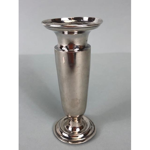 72 - Silver weighted posy or stem vase on circular stepped base engraved with the letter M approx 11cm ta... 