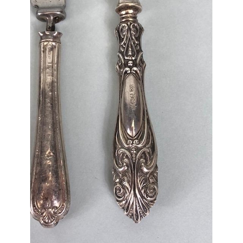 8 - Collection of assorted silver items to include butter knives, spoons etc