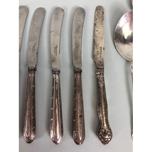 8 - Collection of assorted silver items to include butter knives, spoons etc