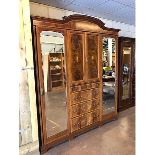 91 - Large triple Edwardian Wardrobe with inlay, drawers, mirrored doors and shelves, a fine example reta... 