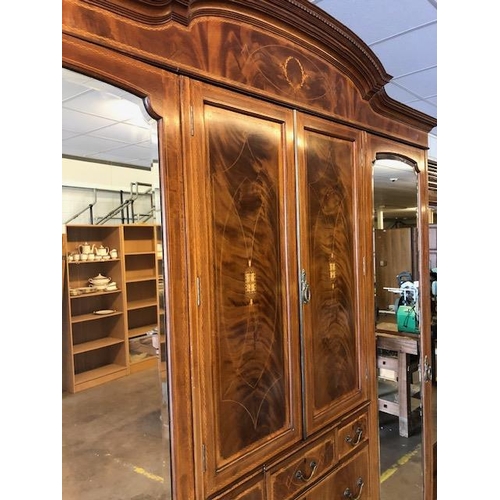 91 - Large triple Edwardian Wardrobe with inlay, drawers, mirrored doors and shelves, a fine example reta... 