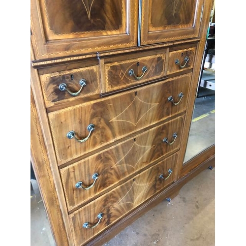 91 - Large triple Edwardian Wardrobe with inlay, drawers, mirrored doors and shelves, a fine example reta... 