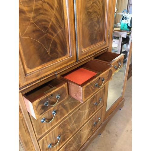 91 - Large triple Edwardian Wardrobe with inlay, drawers, mirrored doors and shelves, a fine example reta... 