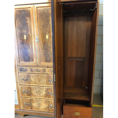 91 - Large triple Edwardian Wardrobe with inlay, drawers, mirrored doors and shelves, a fine example reta... 