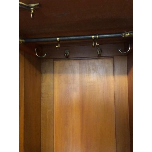 91 - Large triple Edwardian Wardrobe with inlay, drawers, mirrored doors and shelves, a fine example reta... 