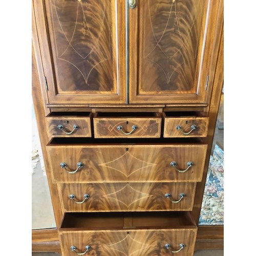 91 - Large triple Edwardian Wardrobe with inlay, drawers, mirrored doors and shelves, a fine example reta... 