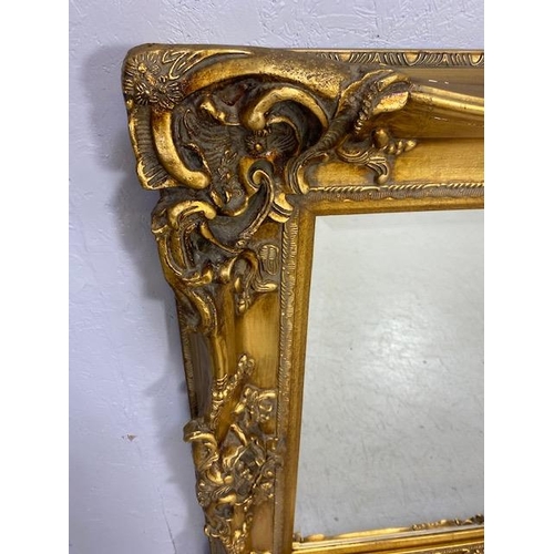 93 - Large Ornate Gold Gilt Mirror with Bevel edged glass approx 132 x 110cm