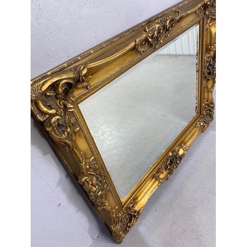 93 - Large Ornate Gold Gilt Mirror with Bevel edged glass approx 132 x 110cm