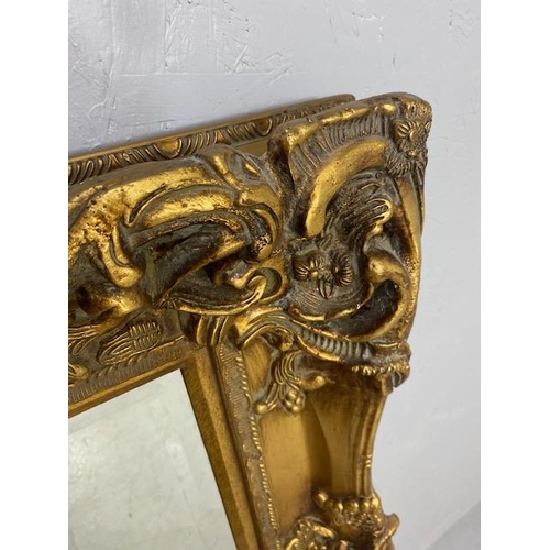 93 - Large Ornate Gold Gilt Mirror with Bevel edged glass approx 132 x 110cm