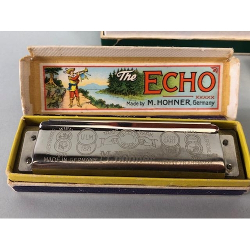 98 - Collection of boxed harmonicas (4)