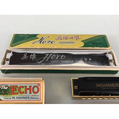 98 - Collection of boxed harmonicas (4)