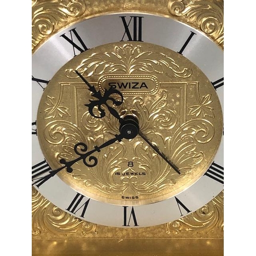 100 - A Tempus Fugit Gold coloured mantle clock, model Swiza