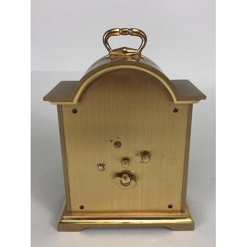 100 - A Tempus Fugit Gold coloured mantle clock, model Swiza