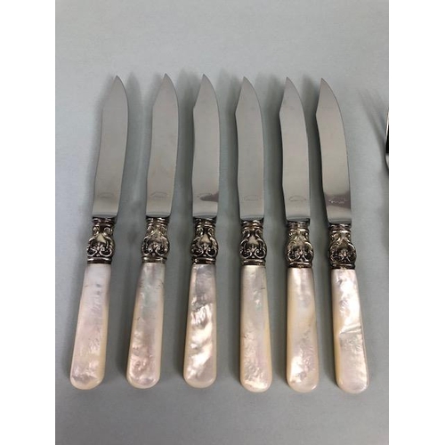 101 - Set of 12 continental MOP handle pastry knives and forks with sterling silver bolsters