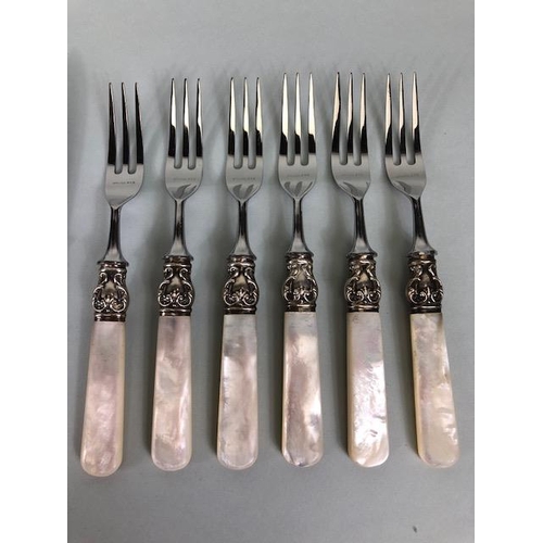 101 - Set of 12 continental MOP handle pastry knives and forks with sterling silver bolsters