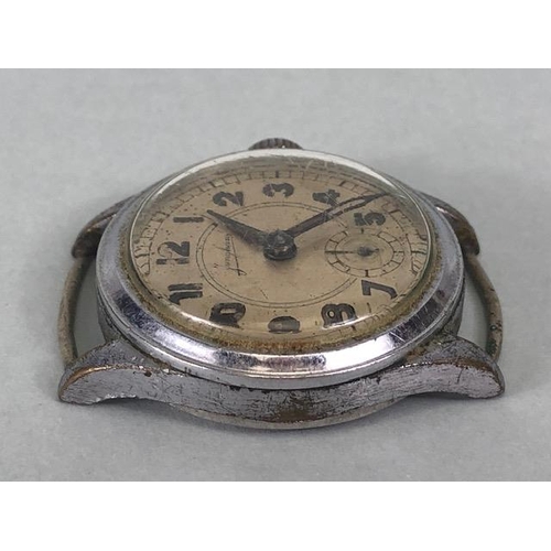 112 - Military watches, WW2 German Junghans strap watch, round face with  Arabic numerals and secondary di... 