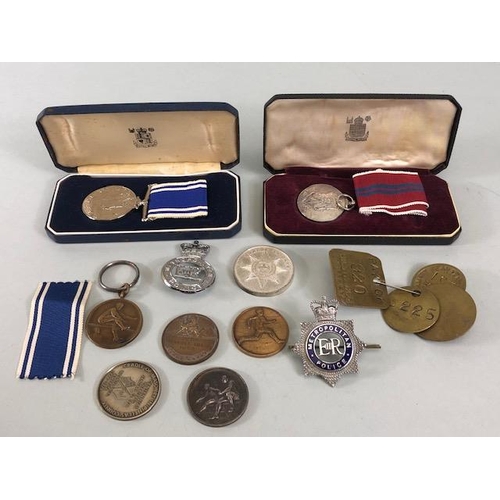 122 - Military and Police interest, collection of Badges and medals to a former Metropolitan Police office... 