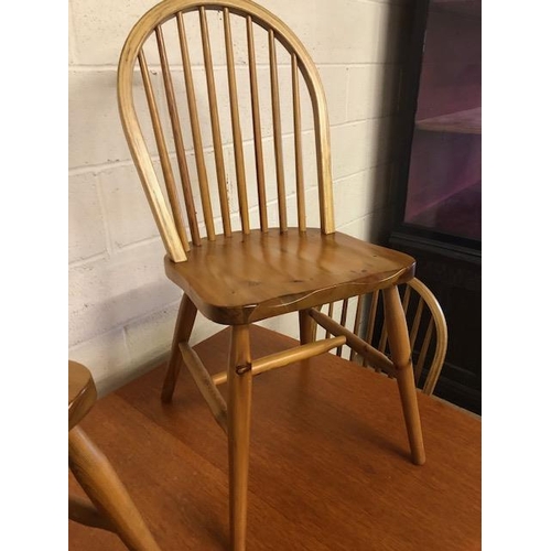 131 - Teak mid century style drop leaf table and four pine chairs