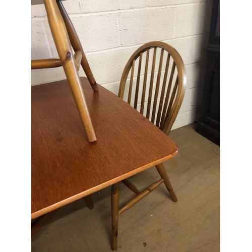 131 - Teak mid century style drop leaf table and four pine chairs