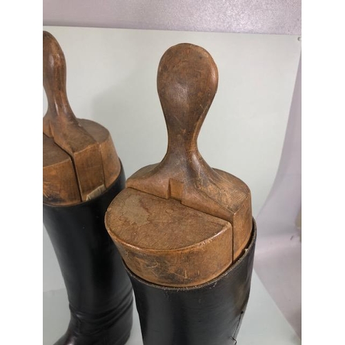 135 - Equestrian racing interest, pair of vintage leather riding  boots with their wooden trees and a vint... 