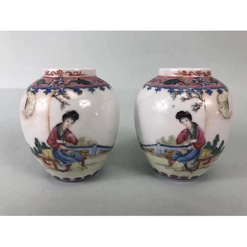 139 - Oriental ceramics, pair of Chinese Famille Rose vases decorated with a young woman in a garden, red ... 