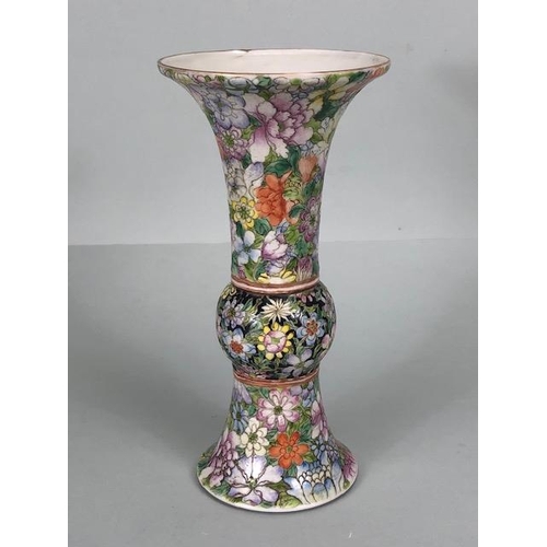 141 - Oriental Ceramics, tall Chinese Famille Noir vase of archaic shape decorated in multi coloured  mill... 