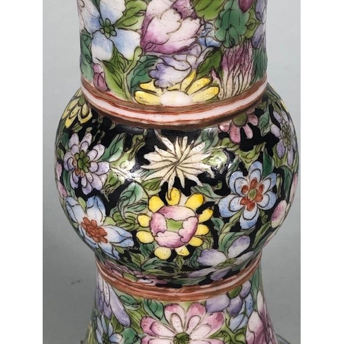 141 - Oriental Ceramics, tall Chinese Famille Noir vase of archaic shape decorated in multi coloured  mill... 