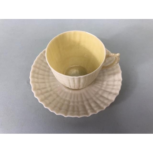 145 - Collectable ceramics, Irish Belleek fluted coffee cup and saucer aopproximately 5cm high