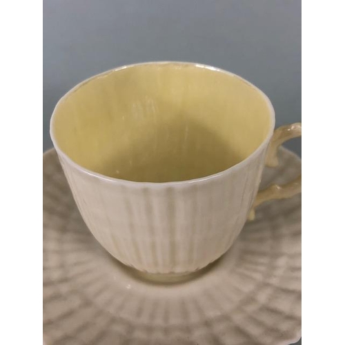 145 - Collectable ceramics, Irish Belleek fluted coffee cup and saucer aopproximately 5cm high