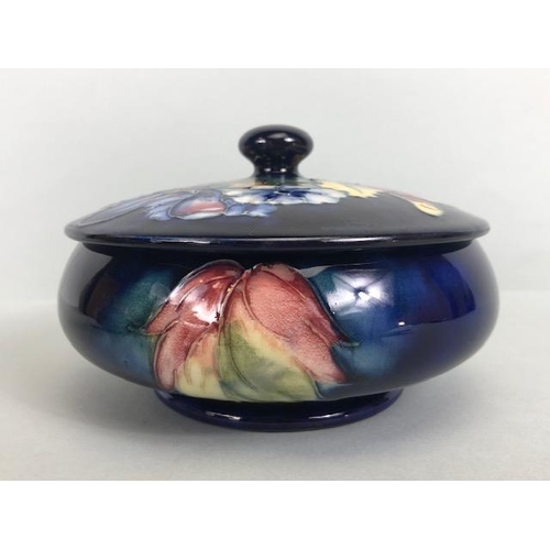 150 - Moorcroft pottery,  Flame of the Forest design marked to base 97, WM with Moorcroft stamp, Orchid de... 