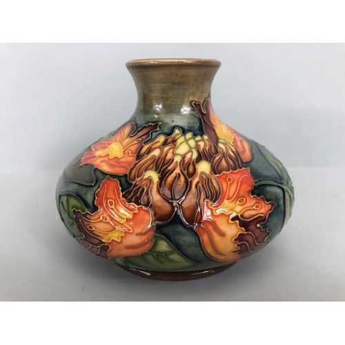 150 - Moorcroft pottery,  Flame of the Forest design marked to base 97, WM with Moorcroft stamp, Orchid de... 