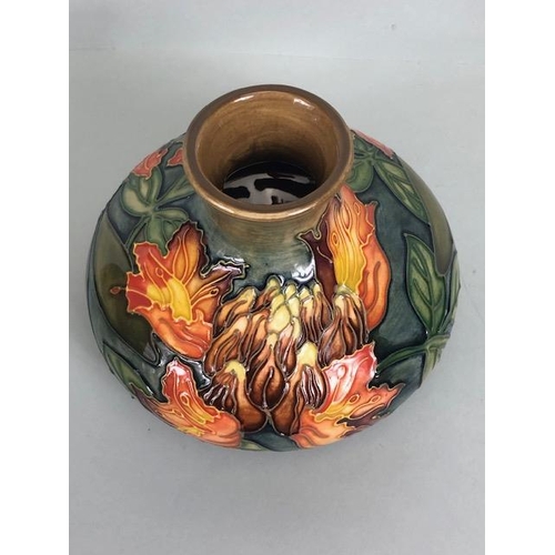 150 - Moorcroft pottery,  Flame of the Forest design marked to base 97, WM with Moorcroft stamp, Orchid de... 