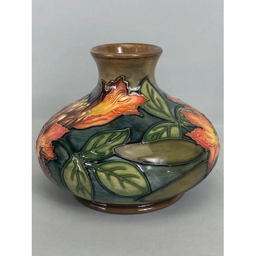 150 - Moorcroft pottery,  Flame of the Forest design marked to base 97, WM with Moorcroft stamp, Orchid de... 