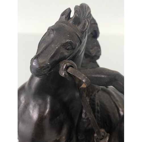 157 - Antique bronze sculpture of a young man and horse, in the manner of the Marly horse groups, signed t... 