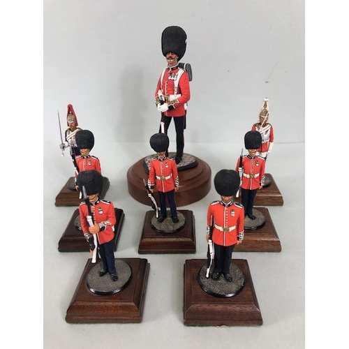 177 - Military Interest, collection of finely hand painted diecast figures of guardsmen, all mounted on wo... 