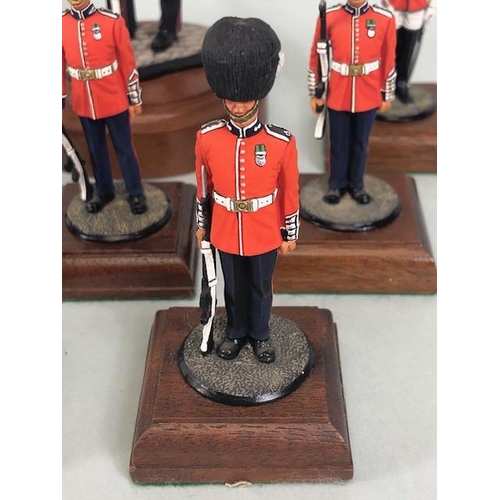 177 - Military Interest, collection of finely hand painted diecast figures of guardsmen, all mounted on wo... 