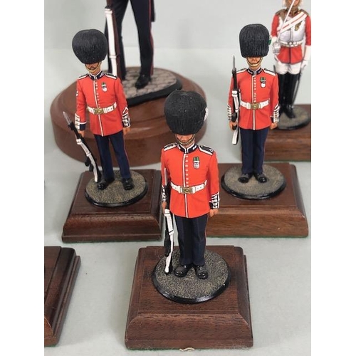 177 - Military Interest, collection of finely hand painted diecast figures of guardsmen, all mounted on wo... 