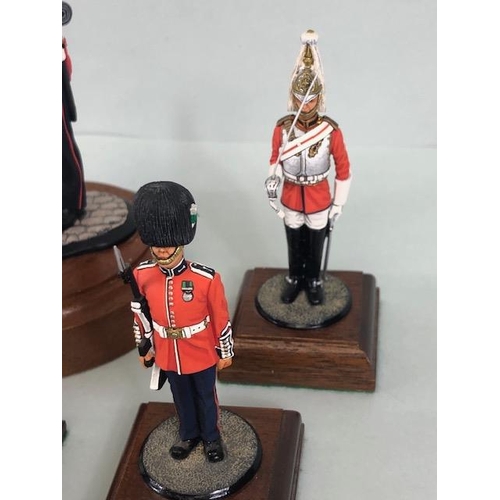 177 - Military Interest, collection of finely hand painted diecast figures of guardsmen, all mounted on wo... 