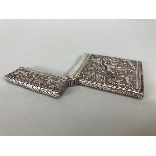 23 - Anglo-Indian silver card case with hinged lid and all over repousse decoration including tigers and ... 