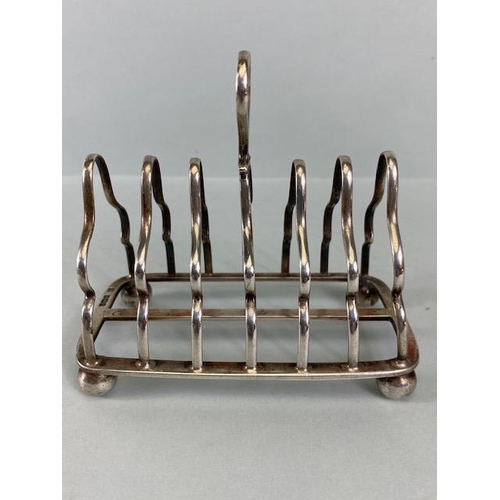 23a - Silver Hallmarked toast rack, hallmarked for Sheffield dated 1912 and by maker Martin Hall & Co Ltd ... 